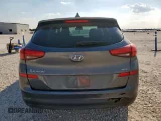 2019 Hyundai Tucson SE z VIN KM8J2CA43KU935537, wystawiony jako Copart lot #85107585 z przebiegiem 159 592 mil mil oraz Czysty tytuł • Clean title. Historia ofert i sprzedaży dostępna na DreamBid. Obrazek 6.