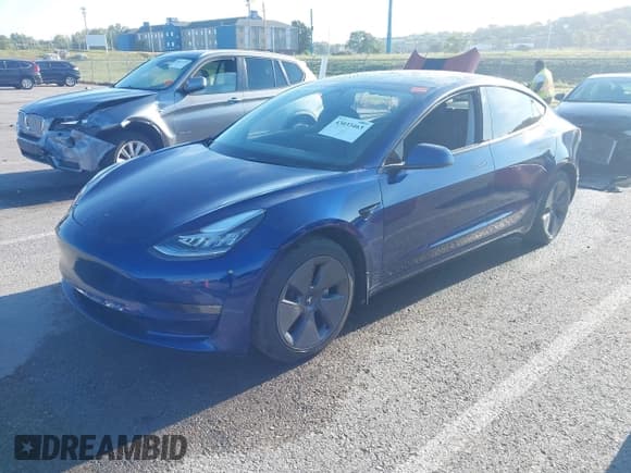 ✅ 2022 Tesla Model 3 Long Range • VIN: 5YJ3E1EB1NF297853 • Lot: 43033463. Listed on IAAI with 50,283 mi. Free auction sales archive from the USA and detailed vehicle history report at DreamBid. Image 20.