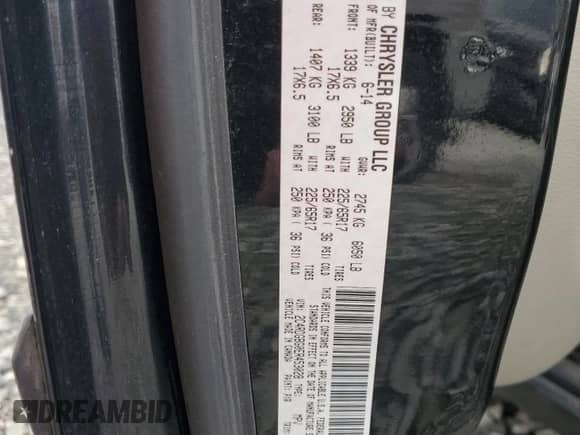 2014 Dodge Grand Caravan SE with VIN 2C4RDGBG0ER453028, listed as a Copart auction lot 90515885 with 179,467 mi miles and Clean title. Bid and sale history available at DreamBid. Image 13.