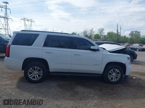 ✅ 2019 Chevrolet Tahoe LT • VIN: 1GNSKBKC4KR391312 • Lot: 42128582. Listed on IAAI with 64,543 mi. Free auction sales archive from the USA and detailed vehicle history report at DreamBid. Image 13.