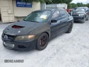 ✅ 2005 Mitsubishi Lancer Evolution VIII • VIN: JA3AH86D05U021760 • Lot: 42974254. Wystawiony na IAAI z przebiegiem Nie podano. Bezpłatny archiwum sprzedaży aukcyjnych z USA i szczegółowy raport historii pojazdu na DreamBid. Zdjęcie 2.