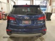 ✅ 2018 Hyundai Santa Fe Ultimate • VIN: 5XYZWDLA1JG507521 • Лот: 91259025. Опубликован ранее на Copart с пробегом 143 697 миль. Бесплатный доступ к архиву аукционных продаж из США и подробный отчёт об истории автомобиля на DreamBid. Изображение 6.