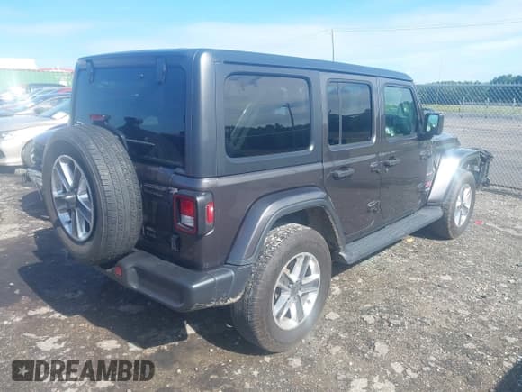 ✅ 2021 Jeep Wrangler Unlimited Sahara • VIN: 1C4HJXEN5MW625834 • Lot: 42635428. Listed on IAAI with 81,888 mi. Free auction sales archive from the USA and detailed vehicle history report at DreamBid. Image 4.