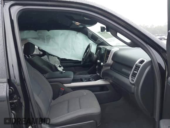 2023 Ram 1500 Lone Star with VIN 1C6RREMT4PN664918, listed as a IAAI auction lot 42942757 with 38,062 mi miles and . Bid and sale history available at DreamBid. Image 5.