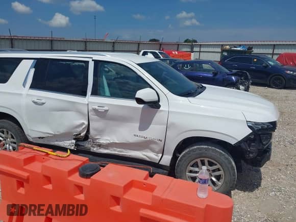 2021 Chevrolet Suburban LT z VIN 1GNSCCKD0MR271974, wystawiony jako IAAI lot #42926142 z przebiegiem 97 622 mil mil oraz . Historia ofert i sprzedaży dostępna na DreamBid. Obrazek 14.