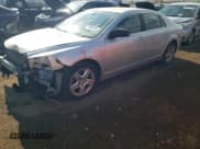 ✅ 2010 Chevrolet Malibu 1LS • VIN: 1G1ZB5EB5AF137094 • Лот: 76660244. Опубликован ранее на Copart с пробегом 125 744 миль. Бесплатный доступ к архиву аукционных продаж из США и подробный отчёт об истории автомобиля на DreamBid. Изображение 1.