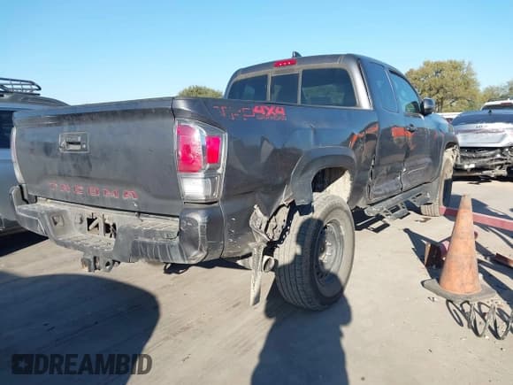 ✅ 2021 Toyota Tacoma SR • VIN: 3TYSZ5AN2MT045020 • Lot: 43612879. Listed on IAAI with 133,289 mi. Free auction sales archive from the USA and detailed vehicle history report at DreamBid. Image 4.