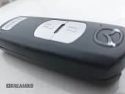 ✅ 2016 Mazda CX-5 Grand Touring • VIN: JM3KE4DY6G0873688 • Lot: 43565324. Wystawiony na IAAI z przebiegiem 80 920 mil. Bezpłatny archiwum sprzedaży aukcyjnych z USA i szczegółowy raport historii pojazdu na DreamBid. Zdjęcie 11.