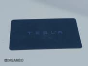 ✅ 2025 Tesla Model Y Long Range • VIN: 7SAYGDED9SF215904 • Lot: 43470903. Listed on IAAI with 27,348 mi. Free auction sales archive from the USA and detailed vehicle history report at DreamBid. Image 11.