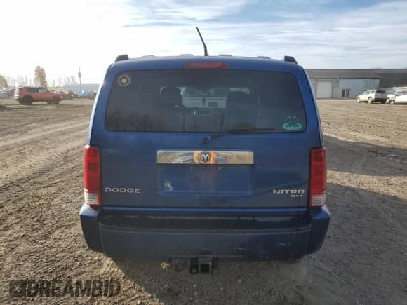 2010 Dodge Nitro SXT z VIN 1D4PU5GK4AW127309, wystawiony jako Copart lot #77405514 z przebiegiem 247 526 mil mil oraz Czysty tytuł • Clean title. Historia ofert i sprzedaży dostępna na DreamBid. Obrazek 6.