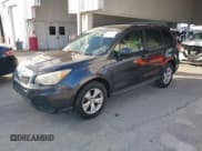 ✅ 2014 Subaru Forester Premium • VIN: JF2SJAEC0EH500152 • Lot: 43634037. Listed on IAAI with 102,945 mi. Free auction sales archive from the USA and detailed vehicle history report at DreamBid. Image 2.