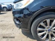 ✅ 2018 Ford Escape Titanium • VIN: 1FMCU9J9XJUA58366 • Lot: 42941884. Listed on IAAI with 157,052 mi. Free auction sales archive from the USA and detailed vehicle history report at DreamBid. Image 17.