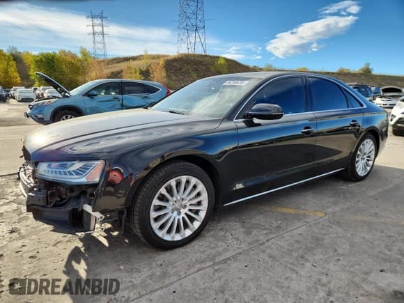 ✅ 2015 Audi A8 • VIN: WAUJGAFDXFN030468 • Lot: 86258435. Listed on Copart with 121,889 mi. Free auction sales archive from the USA and detailed vehicle history report at DreamBid. Image 1.