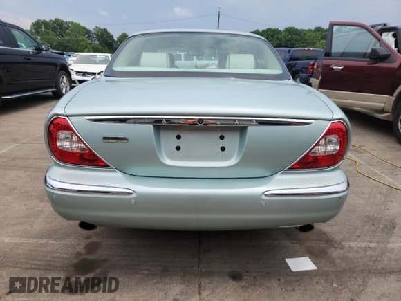 ✅ 2005 Jaguar XJ Vanden Plas • VIN: SAJWA82C55SG42534 • Lot: 62865825. Wystawiony na Copart z przebiegiem 80 906 mil. Bezpłatny archiwum sprzedaży aukcyjnych z USA i szczegółowy raport historii pojazdu na DreamBid. Zdjęcie 6.