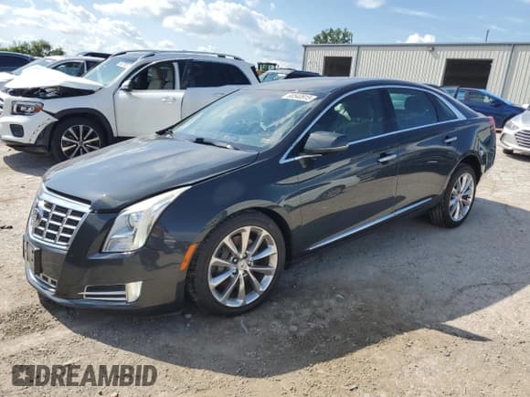 ✅ 2013 Cadillac XTS Luxury • VIN: 2G61R5S36D9152877 • Lot: 68540915. Listed on Copart with 86,531 mi. Free auction sales archive from the USA and detailed vehicle history report at DreamBid. Image 1.