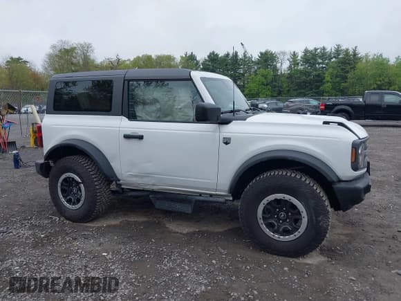 ✅ 2023 Ford Bronco • VIN: 1FMDE5CH6PLC11404 • Lot: 42274412. Listed on IAAI with 5,243 mi. Free auction sales archive from the USA and detailed vehicle history report at DreamBid. Image 6.