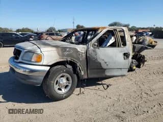 ✅ 2001 Ford F-150 XL • VIN: 1FTRX07WX1KE63914 • Лот: 87848725. Опубликован ранее на Copart с пробегом Не указан. Бесплатный доступ к архиву аукционных продаж из США и подробный отчёт об истории автомобиля на DreamBid. Изображение 1.