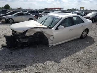 ✅ 2007 Cadillac STS • VIN: 1G6DW677570130889 • Лот: 58073275. Опубликован ранее на Copart с пробегом 124 168 миль. Бесплатный доступ к архиву аукционных продаж из США и подробный отчёт об истории автомобиля на DreamBid. Изображение 1.