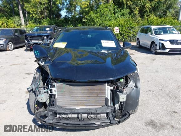 ✅ 2024 Chevrolet Trax 2RS • VIN: KL77LJE26RC212710 • Лот: 43695229. Опубликован ранее на IAAI с пробегом 34 866 миль. Бесплатный доступ к архиву аукционных продаж из США и подробный отчёт об истории автомобиля на DreamBid. Изображение 6.