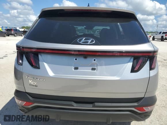 ✅ 2022 Hyundai Tucson SEL • VIN: 5NMJC3AE0NH098557 • Lot: 69377764. Wystawiony na Copart z przebiegiem 15 399 mil. Bezpłatny archiwum sprzedaży aukcyjnych z USA i szczegółowy raport historii pojazdu na DreamBid. Zdjęcie 6.