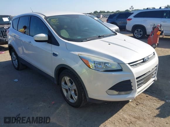 ✅ 2016 Ford Escape SE • VIN: 1FMCU0G79GUB71042 • Lot: 43315061. Listed on IAAI with 104,822 mi. Free auction sales archive from the USA and detailed vehicle history report at DreamBid. Image 1.