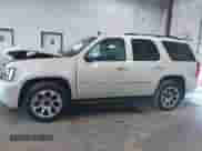 2011 Chevrolet Tahoe LTZ with VIN 1GNSKCE03BR311926, listed as a IAAI auction lot 42677010 with 150,432 mi miles and . Bid and sale history available at DreamBid. Image 14.