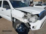 ✅ 2013 Toyota Tacoma PreRunner • VIN: 5TFTX4GNXDX024935 • Lot: 41240807. Listed on IAAI with 188,189 mi. Free auction sales archive from the USA and detailed vehicle history report at DreamBid. Image 6.