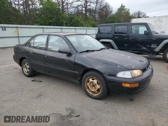 ✅ 1996 Geo Prizm • VIN: 1Y1SK5262TZ007299 • Lot: 62379425. Listed on Copart with 128,742 mi. Free auction sales archive from the USA and detailed vehicle history report at DreamBid. Image 4.