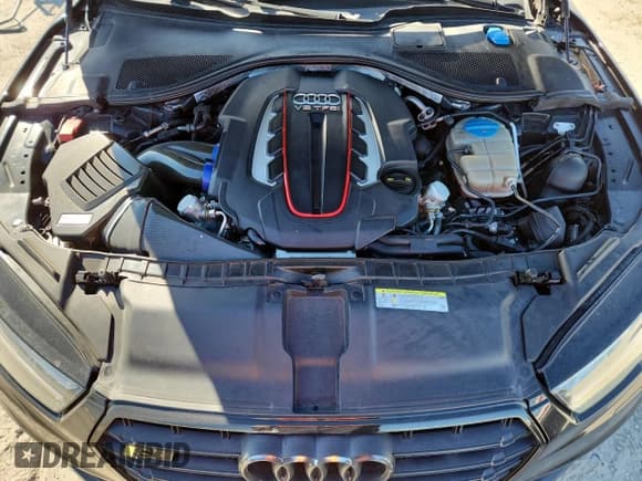 ✅ 2016 Audi S7 • VIN: WAUW2BFC9GN135490 • Лот: 91205115. Опубликован ранее на Copart с пробегом 113 980 миль. Бесплатный доступ к архиву аукционных продаж из США и подробный отчёт об истории автомобиля на DreamBid. Изображение 11.