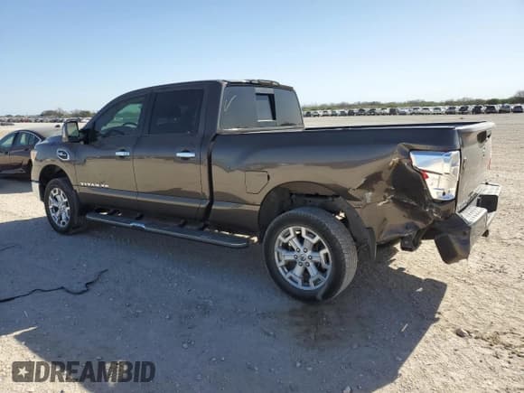 ✅ 2017 Nissan Titan SV • VIN: 1N6AA1F28HN551630 • Лот: 87104504. Опубликован ранее на Copart с пробегом 136 518 миль. Бесплатный доступ к архиву аукционных продаж из США и подробный отчёт об истории автомобиля на DreamBid. Изображение 2.