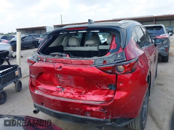 ✅ 2018 Mazda CX-5 Grand Touring • VIN: JM3KFADM3J1394722 • Lot: 43053904. Listed on IAAI with 111,491 mi. Free auction sales archive from the USA and detailed vehicle history report at DreamBid. Image 16.