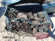 ✅ 1995 Ford Escort LX • VIN: 1FASP15J8SW308311 • Лот: 77624004. Опубликован ранее на Copart с пробегом 345 777 миль. Бесплатный доступ к архиву аукционных продаж из США и подробный отчёт об истории автомобиля на DreamBid. Изображение 12.