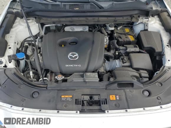 ✅ 2021 Mazda CX-5 Grand Touring • VIN: JM3KFBDM6M0365893 • Lot: 70565575. Wystawiony na Copart z przebiegiem 49 454 mil. Bezpłatny archiwum sprzedaży aukcyjnych z USA i szczegółowy raport historii pojazdu na DreamBid. Zdjęcie 12.