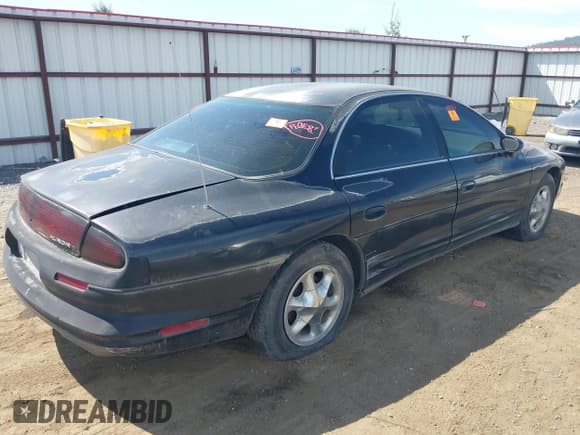 ✅ 1997 Oldsmobile Aurora • VIN: 1G3GR62CXV4123125 • Lot: 42636746. Wystawiony na IAAI z przebiegiem 146 062 mil. Bezpłatny archiwum sprzedaży aukcyjnych z USA i szczegółowy raport historii pojazdu na DreamBid. Zdjęcie 4.
