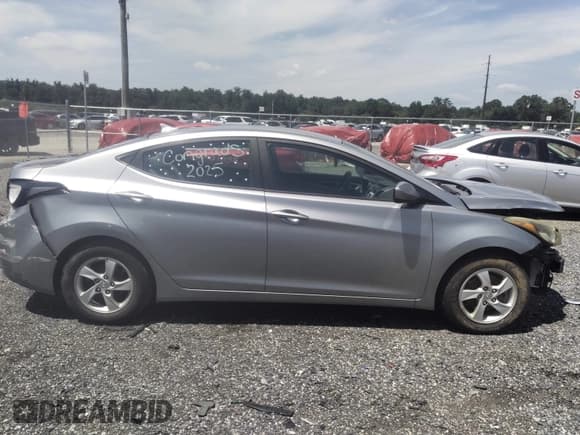 ✅ 2015 Hyundai Elantra SE • VIN: 5NPDH4AE5FH596374 • Lot: 42775670. Listed on IAAI with 96,885 mi. Free auction sales archive from the USA and detailed vehicle history report at DreamBid. Image 13.