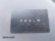 ✅ 2025 Tesla Model Y Long Range • VIN: 7SAYGAEE5SF233291 • Lot: 42771468. Listed on IAAI with 4,953 mi. Free auction sales archive from the USA and detailed vehicle history report at DreamBid. Image 11.