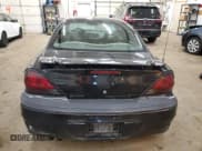 ✅ 2003 Pontiac Grand Am GT • VIN: 1G2NW52EX3M579719 • Лот: 49891365. Опубликован ранее на Copart с пробегом 153 838 миль. Бесплатный доступ к архиву аукционных продаж из США и подробный отчёт об истории автомобиля на DreamBid. Изображение 6.