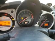 ✅ 2009 Nissan 370Z Touring • VIN: JN1AZ44E99M403555 • Lot: 77612054. Listed on Copart with 154,691 mi. Free auction sales archive from the USA and detailed vehicle history report at DreamBid. Image 9.