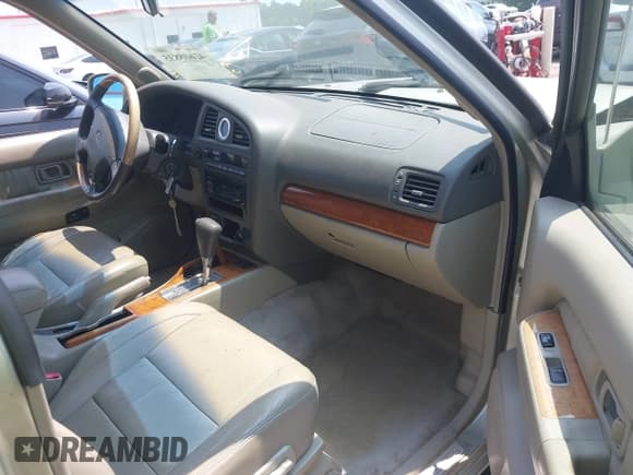 ✅ 2001 Infiniti QX4 Luxury • VIN: JNRDR09Y41W212379 • Lot: 42608835. Wystawiony na IAAI z przebiegiem 259 829 mil. Bezpłatny archiwum sprzedaży aukcyjnych z USA i szczegółowy raport historii pojazdu na DreamBid. Zdjęcie 5.