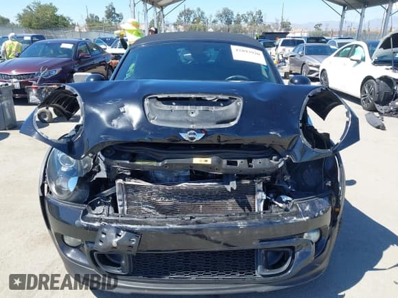 ✅ 2014 MINI Roadster S • VIN: WMWSY3C54ET594668 • Лот: 42893920. Опубликован ранее на IAAI с пробегом 146 994 миль. Бесплатный доступ к архиву аукционных продаж из США и подробный отчёт об истории автомобиля на DreamBid. Изображение 13.