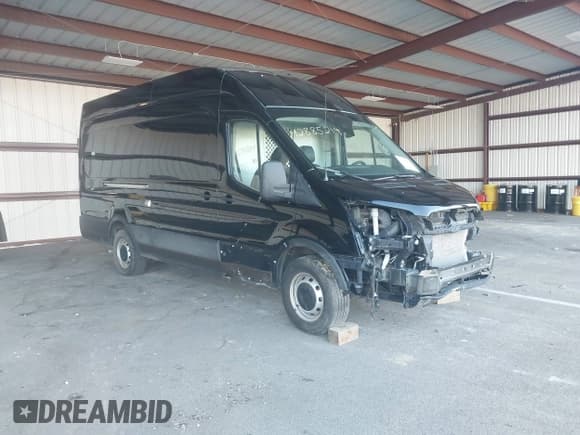 ✅ 2021 Ford Transit Cargo • VIN: 1FTBR3XG8MKA89703 • Lot: 42885214. Listed on IAAI with 79,907 mi. Free auction sales archive from the USA and detailed vehicle history report at DreamBid. Image 1.