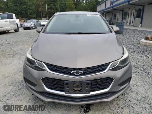 ✅ 2018 Chevrolet Cruze LT • VIN: 1G1BE5SMXJ7246580 • Lot: 81863505. Listed on Copart with 93,506 mi. Free auction sales archive from the USA and detailed vehicle history report at DreamBid. Image 5.