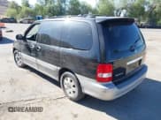 ✅ 2003 Kia Sedona LX • VIN: KNDUP131X36373216 • Lot: 42703440. Wystawiony na IAAI z przebiegiem 174 763 mil. Bezpłatny archiwum sprzedaży aukcyjnych z USA i szczegółowy raport historii pojazdu na DreamBid. Zdjęcie 3.