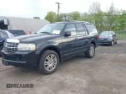 ✅ 2011 Lincoln Navigator • VIN: 5LMJJ2J56BEJ00836 • Lot: 42176594. Listed on IAAI with 160,802 mi. Free auction sales archive from the USA and detailed vehicle history report at DreamBid. Image 2.