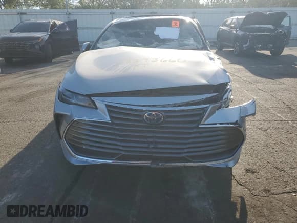 ✅ 2021 Toyota Avalon Limited Hybrid • VIN: 4T1DA1AB2MU002122 • Lot: 82187095. Listed on Copart with 85,792 mi. Free auction sales archive from the USA and detailed vehicle history report at DreamBid. Image 5.