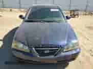 2004 Hyundai Elantra GLS z VIN KMHDN46D44U795391, wystawiony jako Copart lot #75137154 z przebiegiem 154 011 mil mil oraz Szkoda całkowita • Salvage title. Historia ofert i sprzedaży dostępna na DreamBid. Obrazek 5.