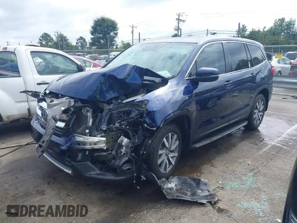 ✅ 2019 Honda Pilot EX-L • VIN: 5FNYF5H51KB038629 • Lot: 43342079. Listed on IAAI with 53,948 mi. Free auction sales archive from the USA and detailed vehicle history report at DreamBid. Image 2.