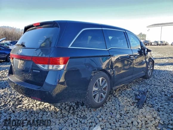 ✅ 2015 Honda Odyssey Touring Elite • VIN: 5FNRL5H93FB111036 • Lot: 93948565. Listed on Copart with 61,703 mi. Free auction sales archive from the USA and detailed vehicle history report at DreamBid. Image 3.