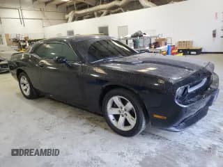 ✅ 2012 Dodge Challenger SXT • VIN: 2C3CDYAG4CH204297 • Lot: 84712494. Wystawiony na Copart z przebiegiem 180 580 mil. Bezpłatny archiwum sprzedaży aukcyjnych z USA i szczegółowy raport historii pojazdu na DreamBid. Zdjęcie 4.