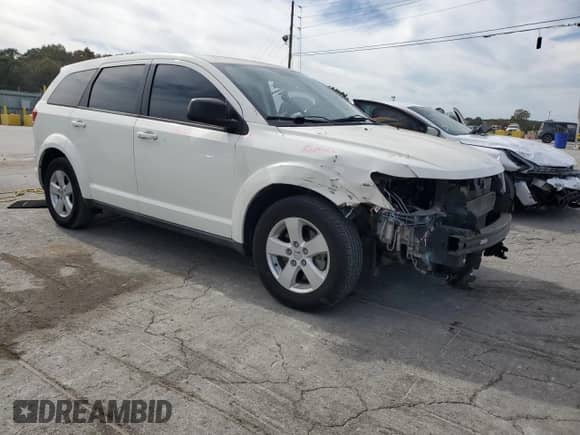 2013 Dodge Journey American Value with VIN 3C4PDCAB0DT575812, listed as a Copart auction lot 86771425 with 113,450 mi miles and Salvage title. Bid and sale history available at DreamBid. Image 4.